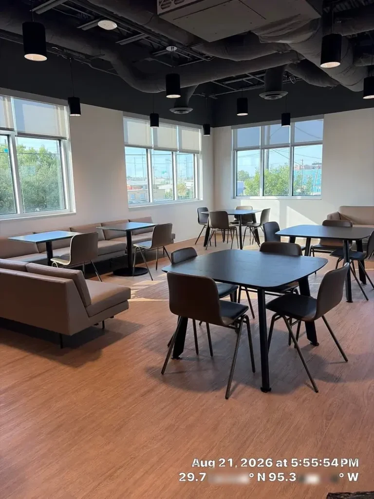 Clean office breakroom with timestamp and city-level GPS stamp